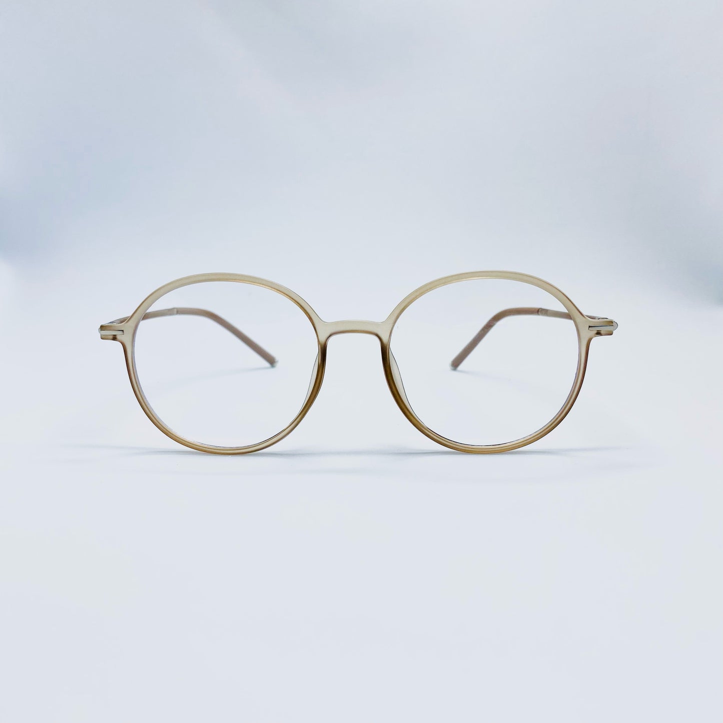 Pupilas Lejanas (Beige-montura)